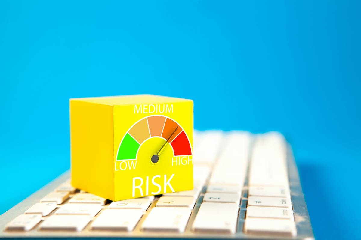 Study Risk Assessments: A researcher reviewing app-generated health data on a tablet with error alerts highlighted